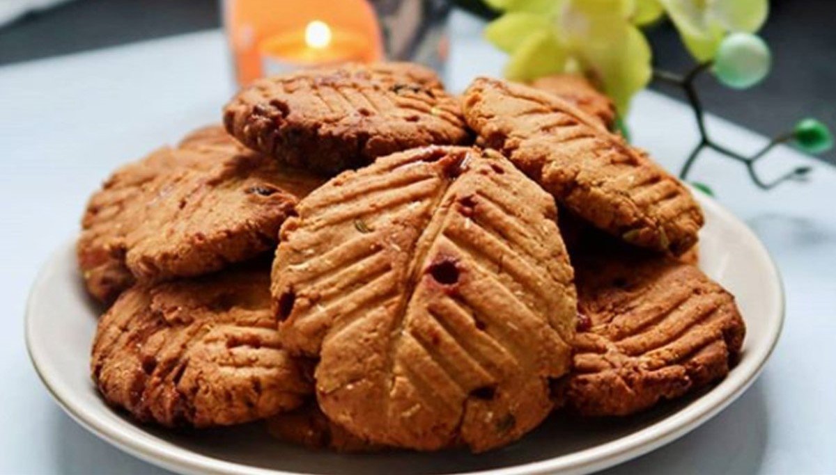 A traditional bamboo basket filled with Thekua, the sacred prasad for Bihar's Chhath Puja